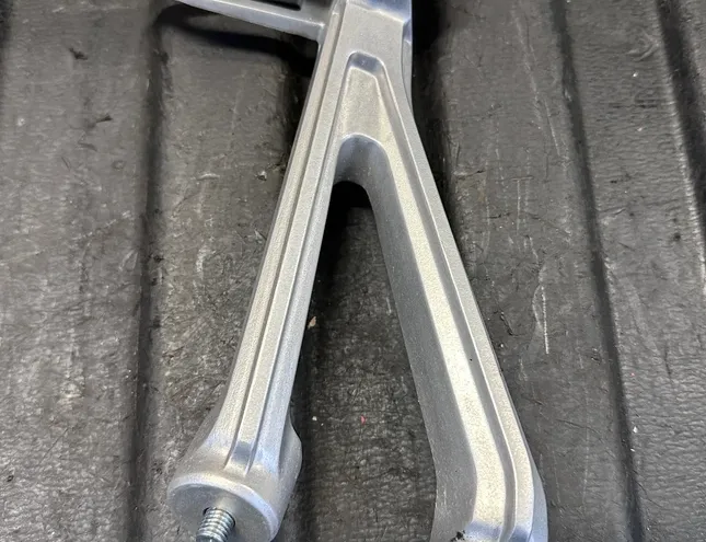 HONDA CB Rear left side footrest peg hanger MKN-L2,MKNL2,K94L12,K94-L1-2 33238511