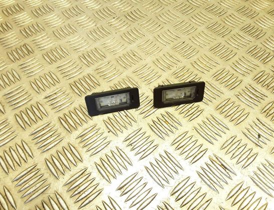 BMW 5 Series F10/F11 (2009-2017) Освещение номерного знака 144151559,63267193293 32971146